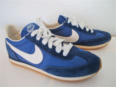 blue and white nike shoes|nike shoes with blue swoosh.